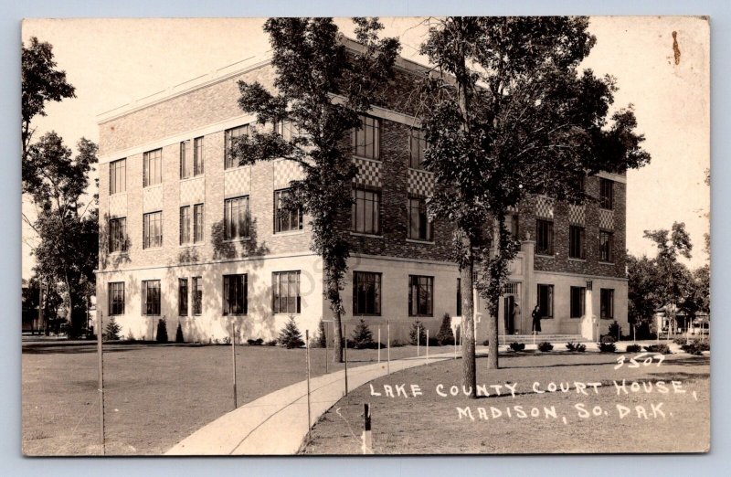 K5/ Madison South Dakota Postcard RPPC c30s Lake County Court House 345