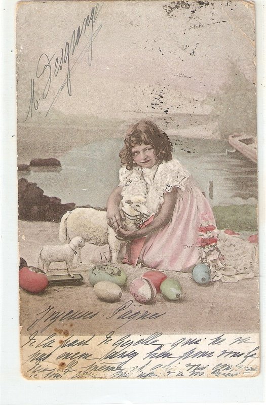 Little girl with her toy lambs. Eggs Old vintage postcard