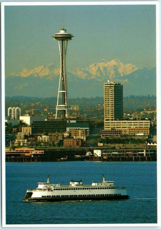 Ferry Boats, the Space Needle and Snow Covered Mountains - Seattle, Washington 