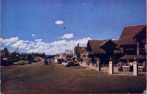 Street View West Yellowstone Montana Postcard Chevron Gas Pumps old cars 1952