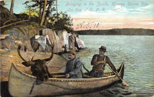 br105600 bringing in the spoils kipawa canoe trip canada cpr