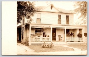 Woman in Dress Sitting on Front Porch Home Street View Real Photo RPPC Postcard