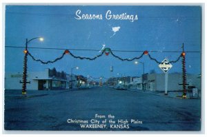 c1960's Seasons Greetings From Christmas City Wakeeney Kansas KS Shops Postcard