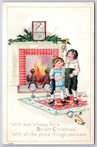 Holiday~Bright Christmas~Children W/ Gifts & Fireplace~Emb~Vintage Postcard