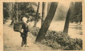 1926 Woman with Rake and Basket in Forest by Lake Vintage Postcard