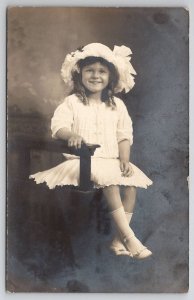 RPPC Little Girl Bessie Montgomery White Ruffle Hat and Smile Postcard S27