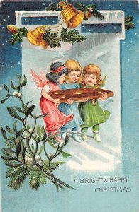 Christmas Greetings Angels Carrying Domino Vintage Postcard AA50473