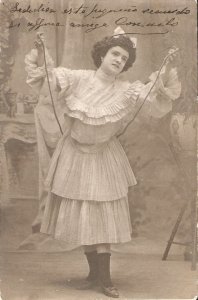 Pretty lady. Playing the rope  Old vintage French photo postcard