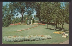 Minnesota St. Paul Gates Ajar Coma Park floral display at entrance pm1960