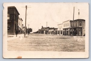 J90/ Cooperstown North Dakota RPPC Postcard c1910 Main Street Stores  654