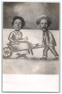 c1910s Caricature Man Woman Wheelbarrow Dog RPPC Photo Unposted Antique Postcard