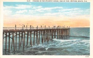 Fishing in the Atlantic Ocean, End of Pier Daytona Beach, Florida  