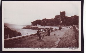 P1548 vintage unused RPPC people on walkway dunollie castle oban scotland