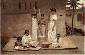 India Indigenous Culture Women and Girls Pounding Rice c1910 Vintage Postcard