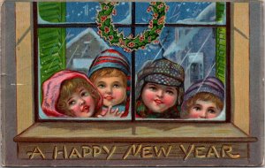 New Year Postcard Children Outside in Snow Looking Through Window, Holly Wreath