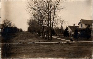 RPPC 15th Street Lexington Nebraska Postcard dirt road windmill children homes