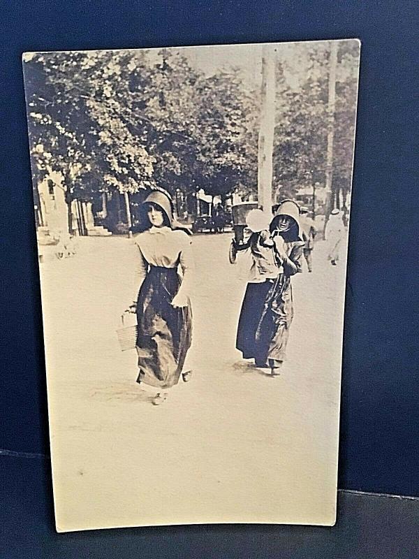 Postcard  RPPC showing Amish Women & Children on a Street in Lancaster, PA.  W8