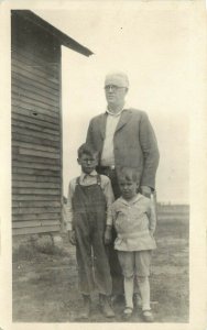 RPPC Postcard; Worried Man with 2 Young Boys on the Prairie, Unknown US