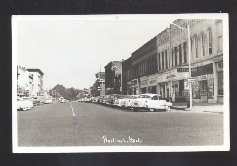 RPPC HASTINGS MICHIGAN 1950's CARS DOWNTOWN STREET SCENE REAL PHOTO POSTCARD
