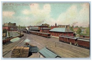 1912 M.C.R.R. Yards Locomotive Train Building Exterior Jackson Michigan Postcard