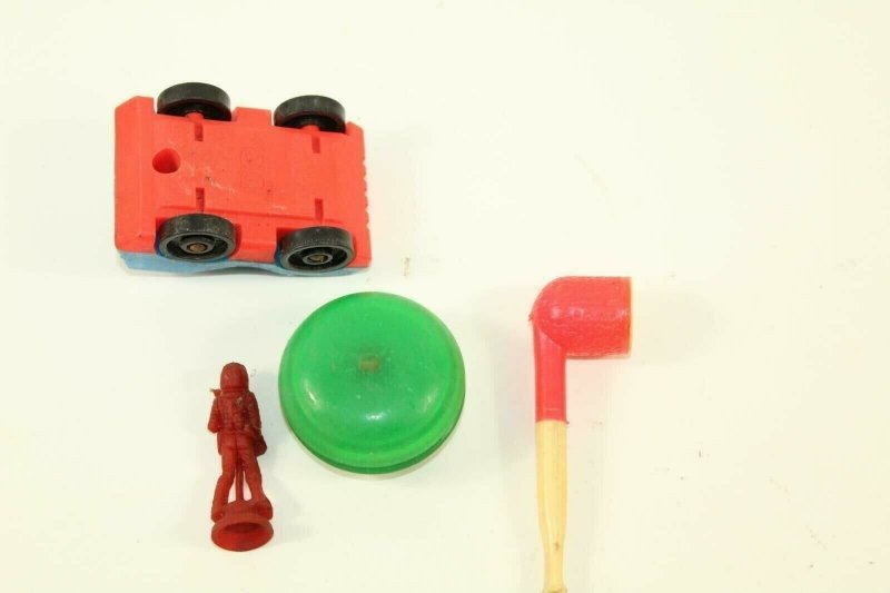 4 Retro Toys Rubber Space Man Fisher Price Police Car Duncan Yo-Yo Pipe