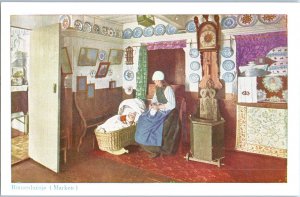 Woman Sewing Beside Her Baby In House In Marken Village Netherlands Postcard