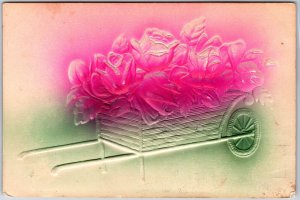 1909 Embossed Flower on Cart Greetings and Wishes Card Posted Postcard