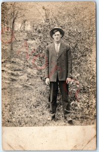 c1910 Bloomfield, Neb. Man in Forest RPPC Real Photo S Elwood Music Dealer A140