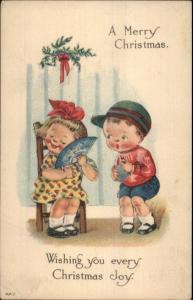 Christmas Cute Children Flirt Girl w/ Fan Series #4917 c1915 Postcard