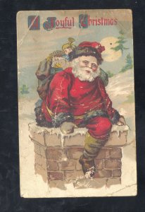 A JOLLY CHRISTMAS SANTA CLAUS RED ROBE CHIMNEY VICTORIAN VINTAGE POSTCARD