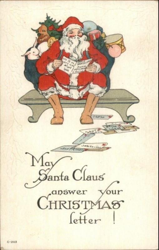 Christmas - Santa Claus Reading Letters Series C-203 c1910 Postcard