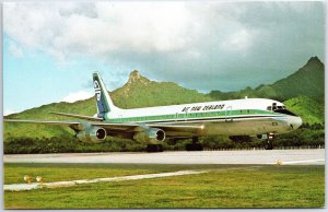 VINTAGE POSTCARD AIR NEW ZEALAND DC-8 AIRCRAFT ON THE TARMAC