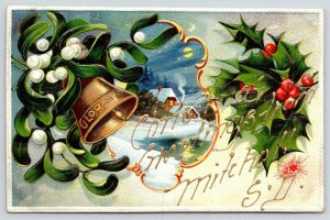 Mitchell South Dakota~Christmas Greetings~Embossed Holly-Bell-Mistletoe~c1910