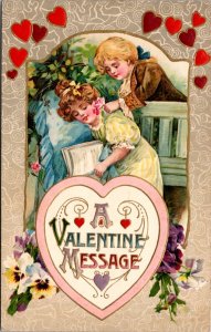 Valentine Postcard Boy Giving Girl Who's Reading a Book on a Bench a Flower