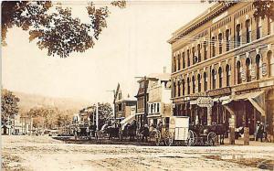 Newport NH Store Front's Horse & Delivery Wagons RPPC Postcard