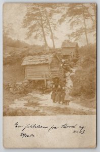 RPPC Norway Darling Children Frozen Water Cabins Rocky Creek Photo Postcard U21