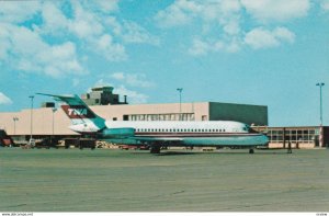 DAYTON , Ohio , 1960s ; TWA airplane at airport