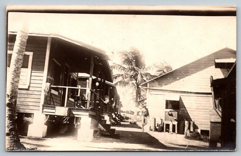 RPPC  WW1 US Army Barracks Soldier Walking  - Real Photo Postcard  c1917