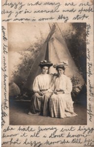 VINTAGE POSTCARD TWO WOMEN POSE IN PERIOD DRESS UNPOSTED PENCIL WORDS 1908