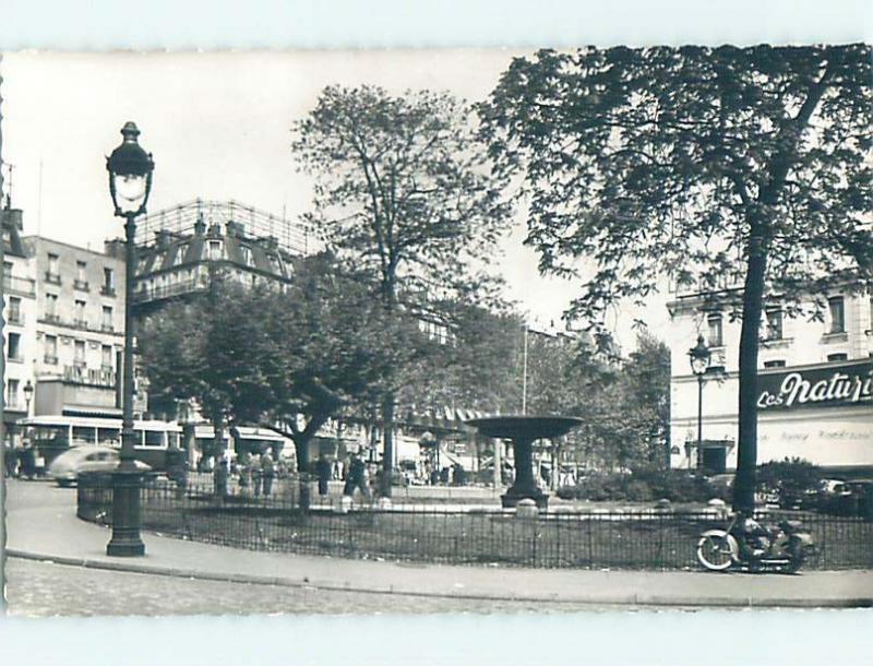 old rppc ANTIQUE MOTORCYCLE PARKED ALONG THE FENCE Paris France HM1568