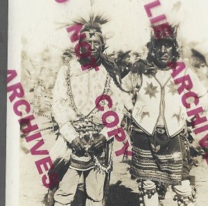 South Dakota? RPPC c1920s SIOUX INDIANS Indian Posing DANCE Beadwork Bells SD?