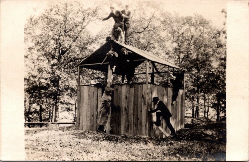 Real Photo Postcard Men Climbing on a Wood Building House Structure~3361