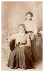 Black and White Portrait Two Women in Skirts Hair in Buns RPPC Postcard