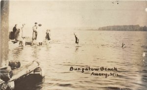 F94/ Amery Wisconsin RPPC Postcard 1925 Bungalow Beach Swimmers