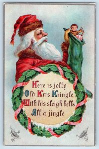 Christmas Santa Claus Stocking Full Of Toys Wreath Embossed Antique Postcard