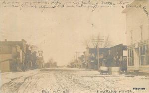 C-1907 PLAINFIELD IOWA Looking North Street Scene RPPC postcard 12503