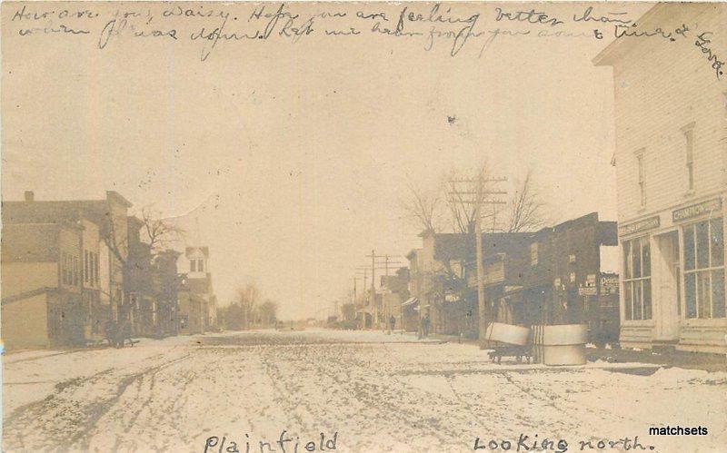 C-1907 PLAINFIELD IOWA Looking North Street Scene RPPC postcard 12503