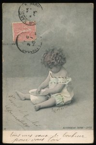 Baby playing in pot. 1905 hand tinted Real Photo Postcard. Alterocca Terni