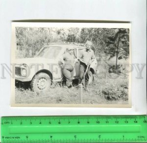 452561 USSR elderly couple in the country car Niva Old photo