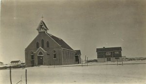 c1910 RPPC; Small Church on the Prairie & House in Winter, Unknown US Location